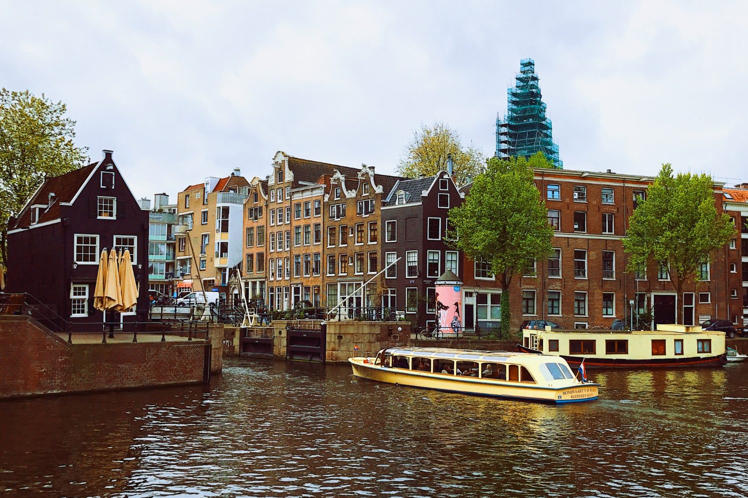 dark-clouds-canal-amsterdam-e1694637774565